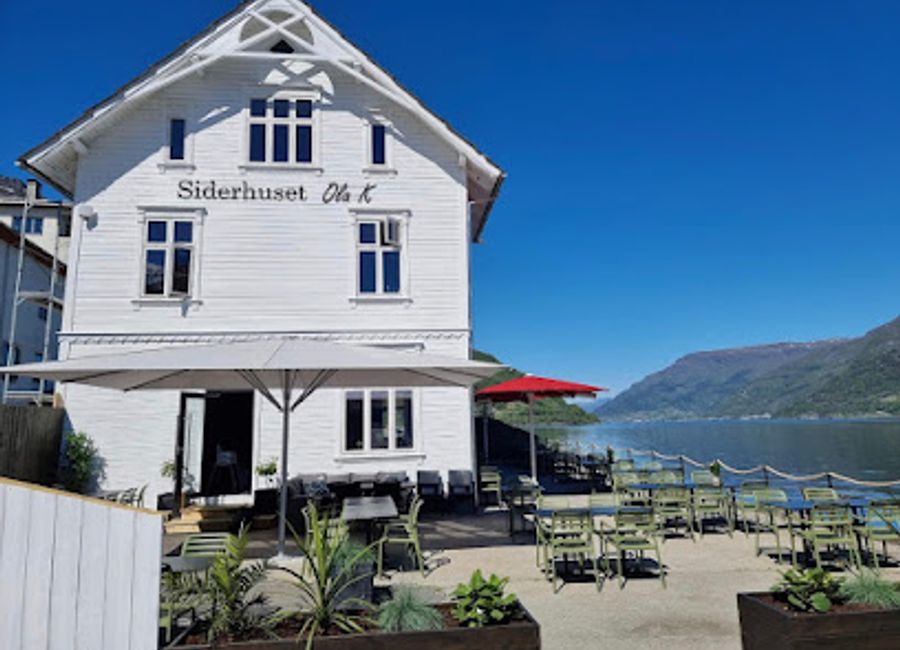Experience exquisite dining at Siderhuset Ola K with breathtaking fjord views and a menu that celebrates local flavors.