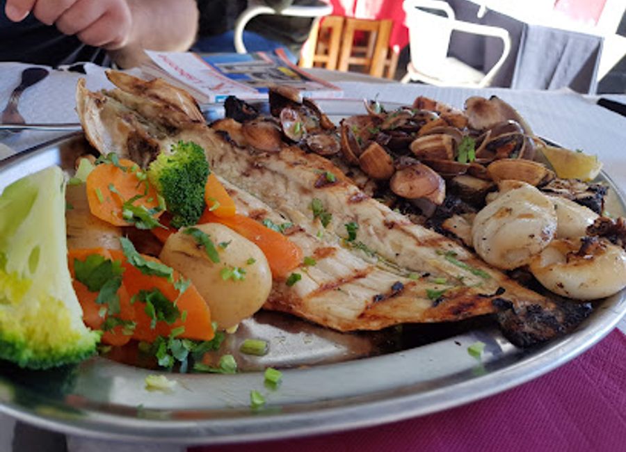 Experience authentic Portuguese cuisine at Restaurante Costa Vicentina in Lisbon - where every dish tells a story from the sea.