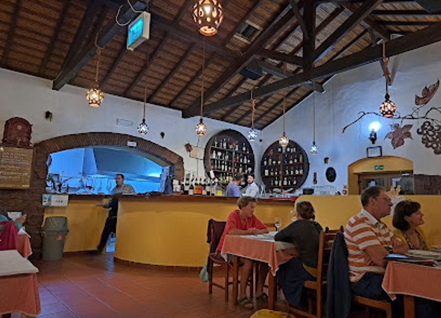 Discover authentic Portuguese cuisine at Taberna do Gabão in Odeceixe, where tradition meets flavor in a cozy setting.
