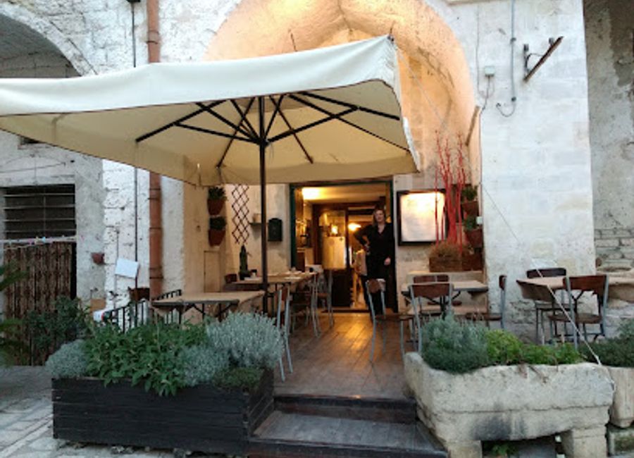 Experience authentic Italian cuisine at Trattoria del Caveoso in Matera - where tradition meets flavor amidst breathtaking scenery.