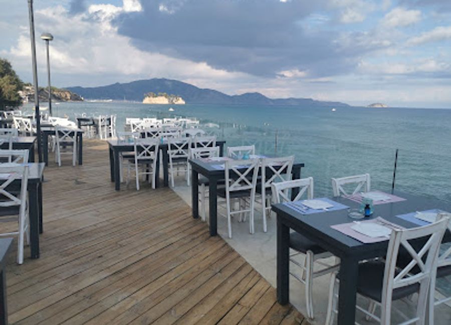 Experience exquisite seafood and vibrant cocktails at Aperitto Resto Bar in Zakynthos, where culinary delights meet breathtaking views.