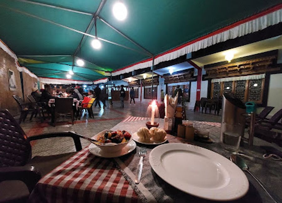 Discover the rich flavors of Tibet at The Tibetan Kitchen in Leh – a culinary gem amidst Ladakh's breathtaking landscapes.