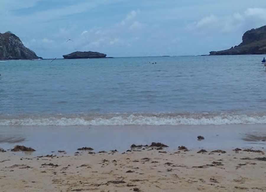 Experience authentic Brazilian cuisine with stunning sunset views at Palhoça da Colina Bar e Restaurante in Fernando de Noronha.