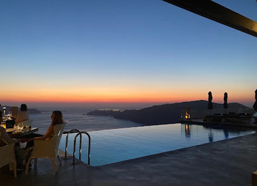 Discover culinary artistry at Fly Away Creative Restaurant & Bar in Imerovigli—where Mediterranean flavors meet breathtaking caldera views.