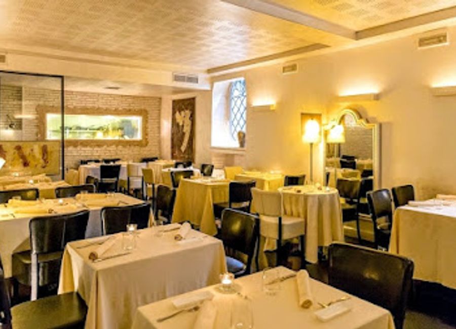 Experience the authentic taste of Italy at Antico Arco - where Mediterranean meets Roman cuisine in an elegant setting.