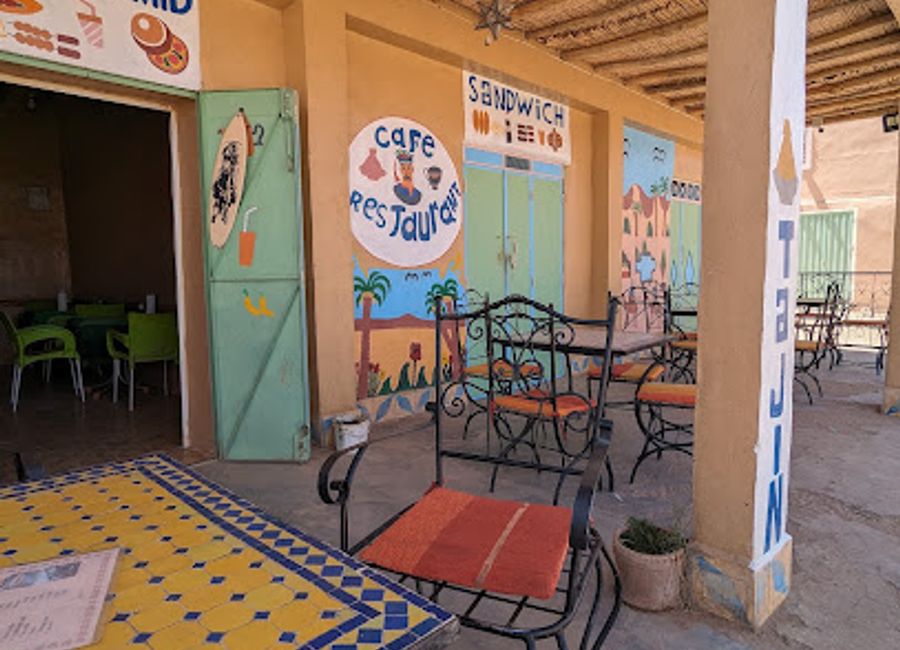 Experience authentic Moroccan flavors at Café Snack Restaurant Hamid in Merzouga – where every dish tells a story.