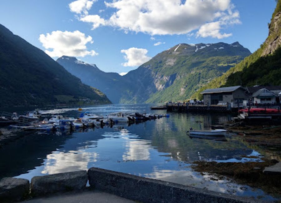 Discover CaféOlé in Geiranger - your go-to spot for exquisite coffee and delightful local novelties amidst breathtaking fjord views.