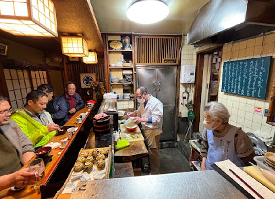 Discover authentic Japanese dining at Ajikyu in Kyoto—where tradition meets exquisite culinary artistry.