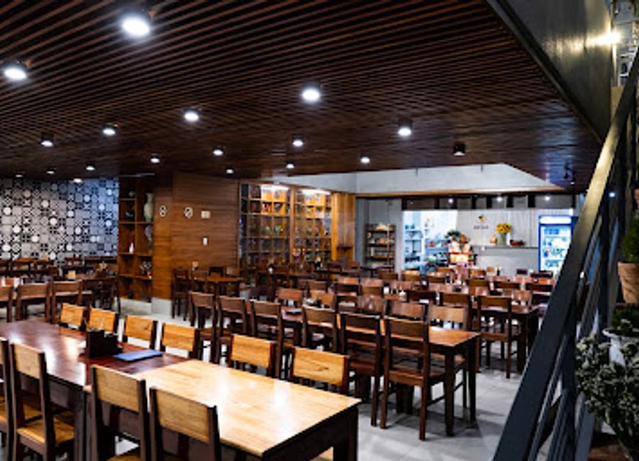 Discover authentic Vietnamese flavors at Quán Hạnh in Huế - a culinary gem offering traditional dishes in a cozy atmosphere.