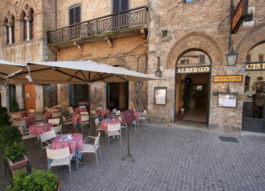Experience authentic Italian cuisine with breathtaking views at Le Terrazze in San Gimignano.