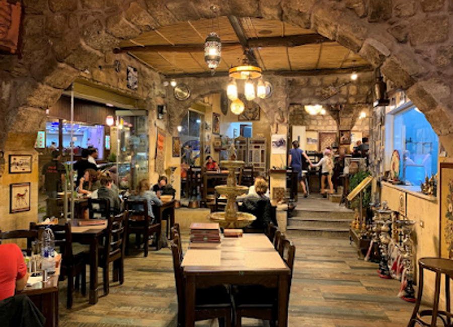 Experience authentic Jordanian cuisine at Al Wadi Restaurant in Wadi Musa – where tradition meets taste in a stunning setting.
