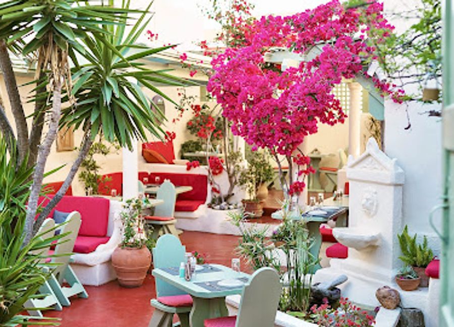Experience authentic Greek flavors at Karma Greek Restaurant in Oia - a perfect blend of stunning views and delicious cuisine.