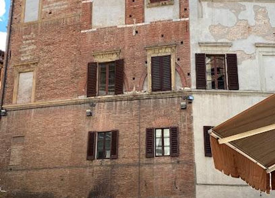 Experience authentic Italian dining at Osteria Pizzeria Sotto le Logge del Papa in Siena - where flavor meets tradition.