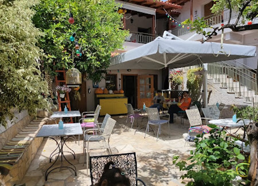 Experience authentic Greek cuisine and vibrant atmosphere at Yioryitsa's Backyard in West Mani.
