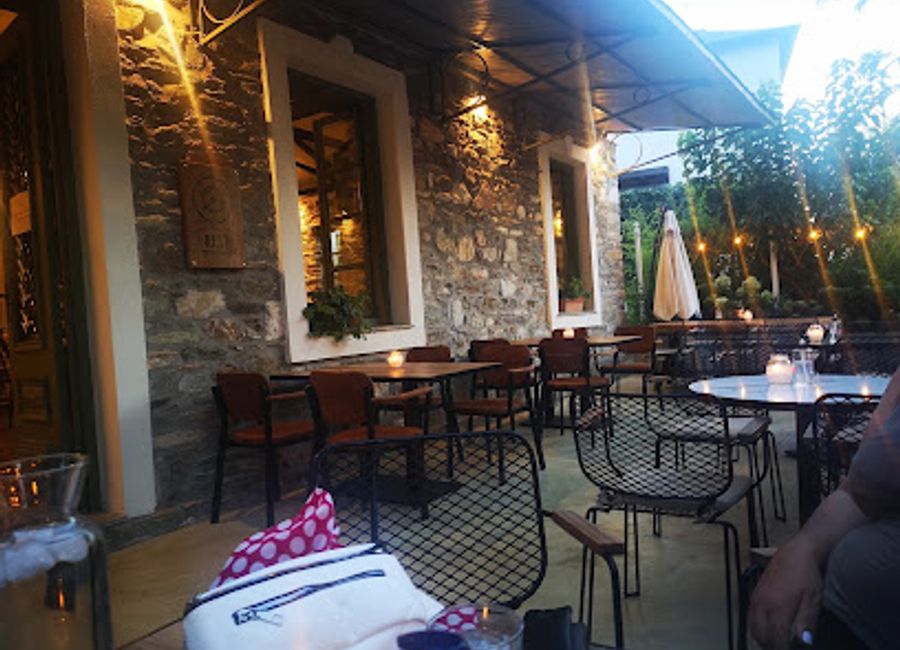 Discover Agora 1955 in Portaria: Where traditional Greek flavors meet modern culinary artistry in an inviting atmosphere.