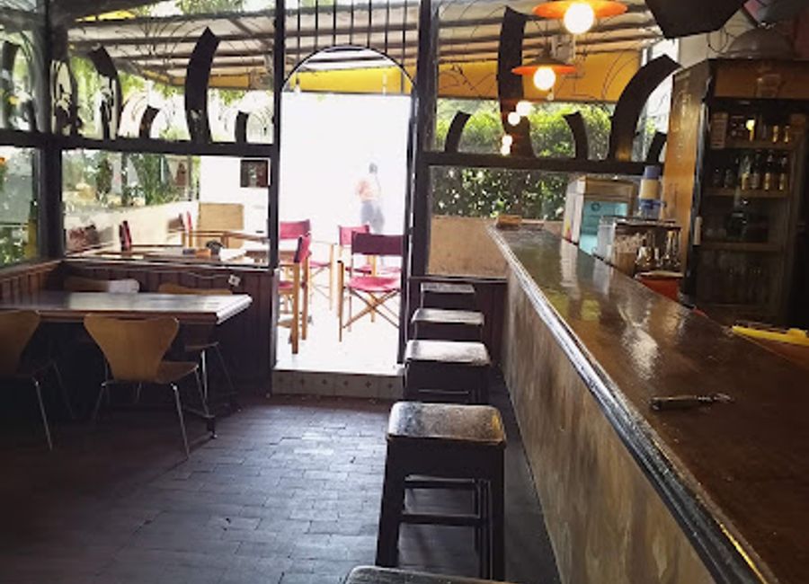 Discover delicious Senegalese cuisine in a vibrant setting at L'Impérial Bar & Brasserie in Dakar's historic Independence Square.