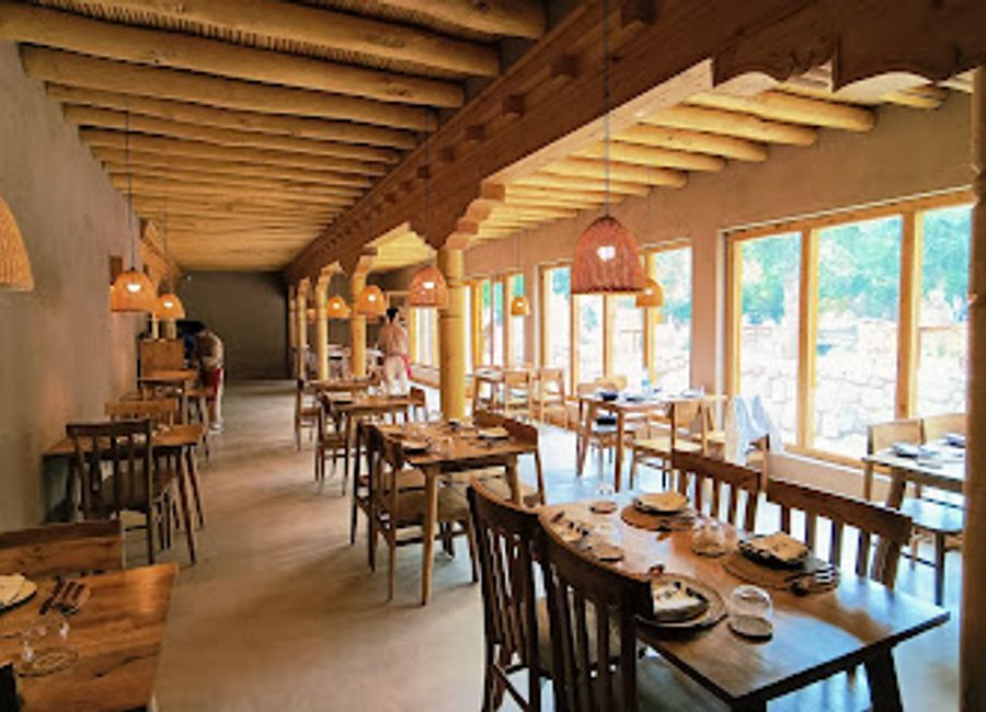 Discover Tsas by Dolkhar: A delightful restaurant and bar in Leh serving authentic Ladakhi cuisine amidst stunning mountain views.