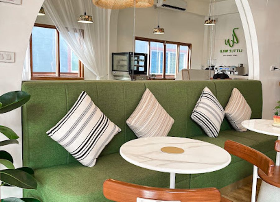 Explore Little Wild Cafe Khao Sok - A tranquil coffee shop offering authentic Thai cuisine amidst stunning natural beauty.