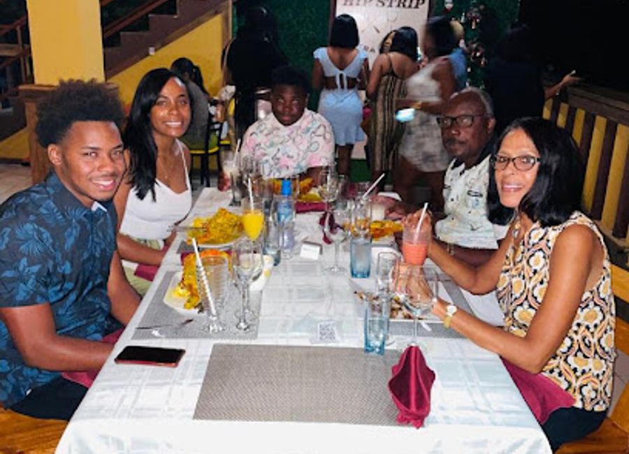 Discover authentic Jamaican cuisine and vibrant nightlife at Di Hip Strip Ultra Lounge in Port Antonio - a must-visit hotspot for travelers.