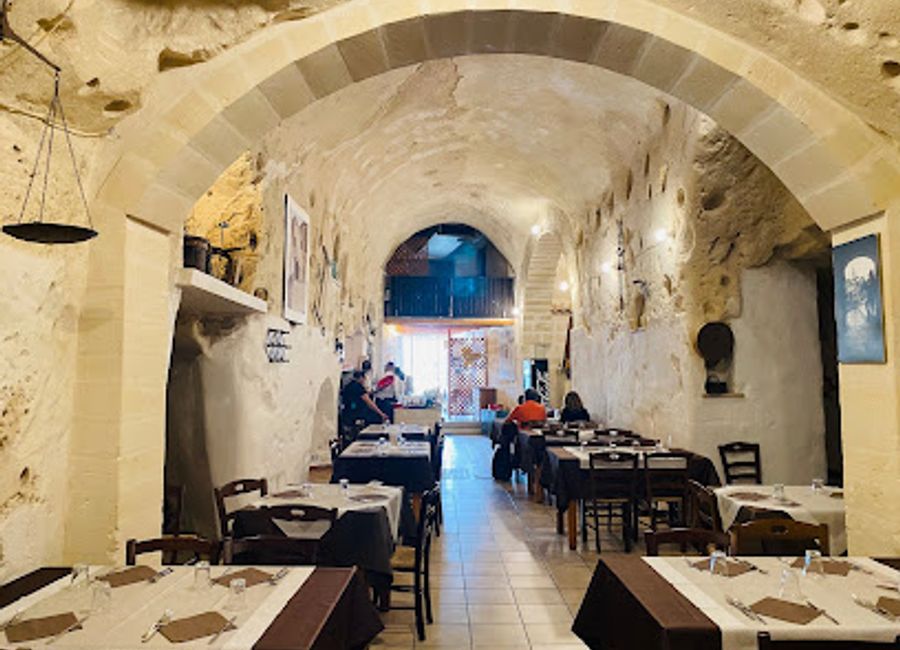 Experience authentic Italian flavors in the heart of Matera at Osteria Belvedere al Vecchio Frantoio, where tradition meets culinary excellence.