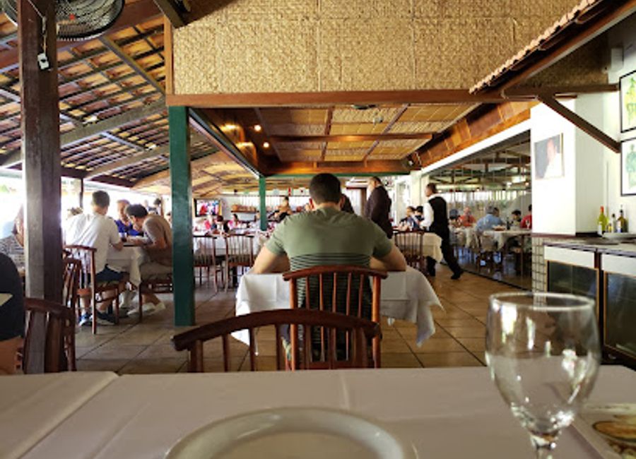 Experience authentic Bahian seafood delights at Restaurante Bargaço in Salvador, where fresh flavors meet vibrant coastal views.