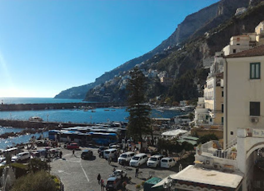Discover Trattoria San Giuseppe in Amalfi – where fresh seafood meets authentic Italian cuisine amid breathtaking coastal views.