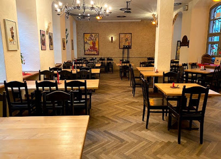 Savor the vibrant flavors of Spain at Restaurant Cafe Madrid, where authentic dishes meet warm hospitality in Leipzig's lively atmosphere.