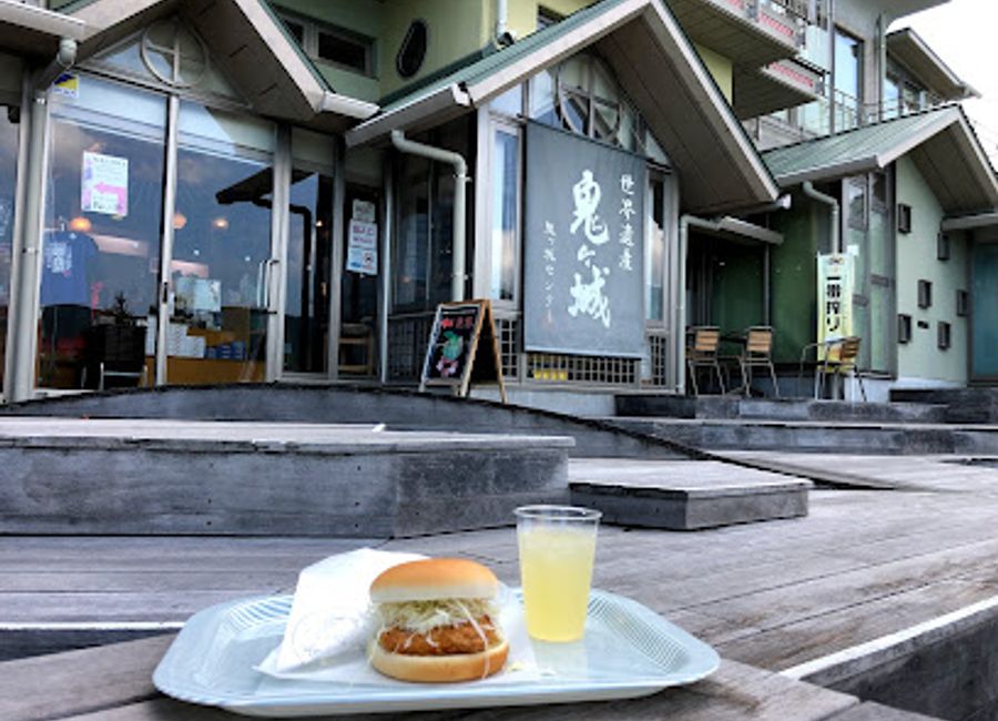 Experience authentic Mie Prefecture cuisine at Onigajō Cliff Center while enjoying breathtaking coastal views and unique souvenirs.