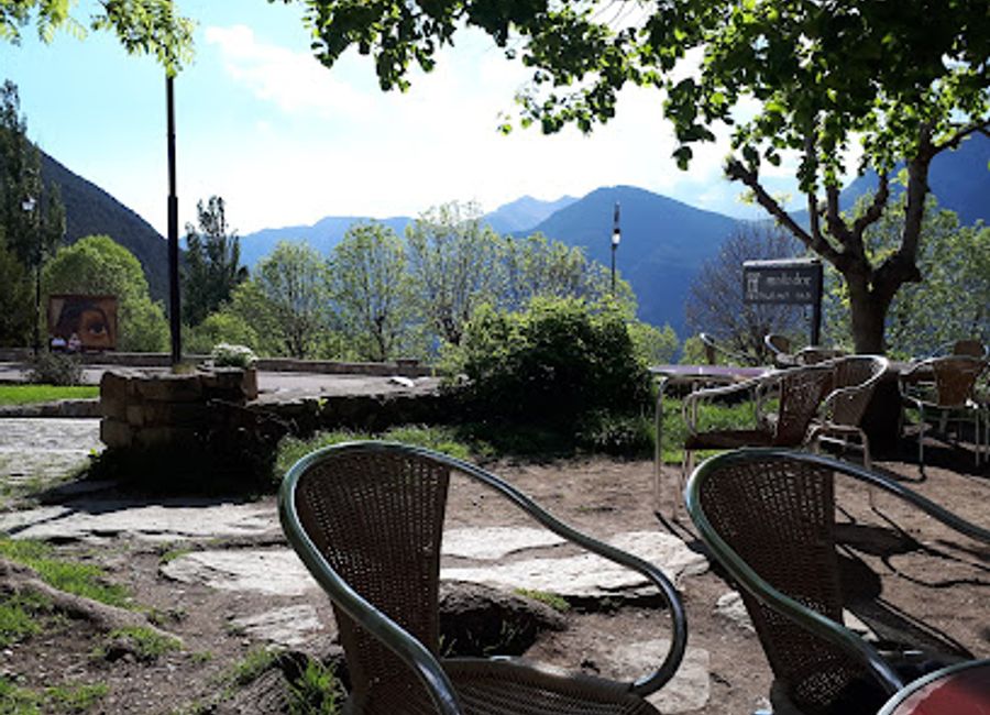 Experience authentic Mediterranean flavors at Restaurant Mallador in scenic Taüll - a culinary haven nestled in nature's beauty.