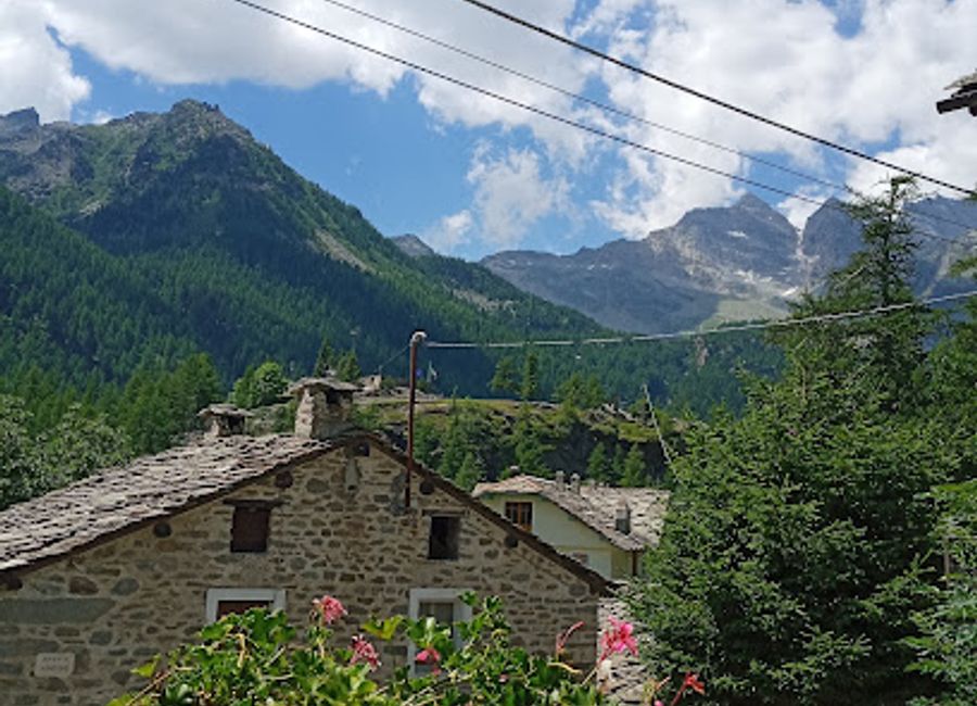Discover authentic Italian cuisine at Ristorante La Genzianella in Ceresole Reale, where tradition meets breathtaking alpine views.