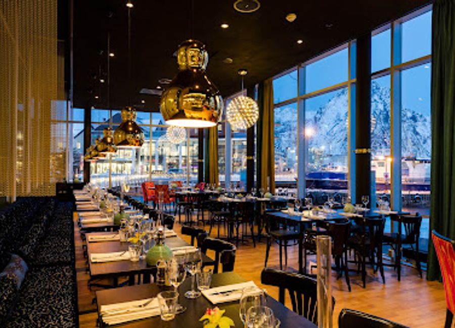 Experience authentic Norwegian cuisine at Paleo Arctic in Svolvær, where local ingredients meet stunning Arctic views for an unforgettable dining experience.