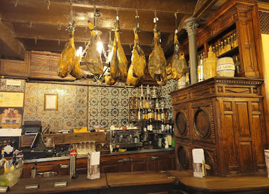 Discover El Rinconcillo: A historic Andalusian restaurant in Seville offering authentic tapas and regional dishes in a charming setting.