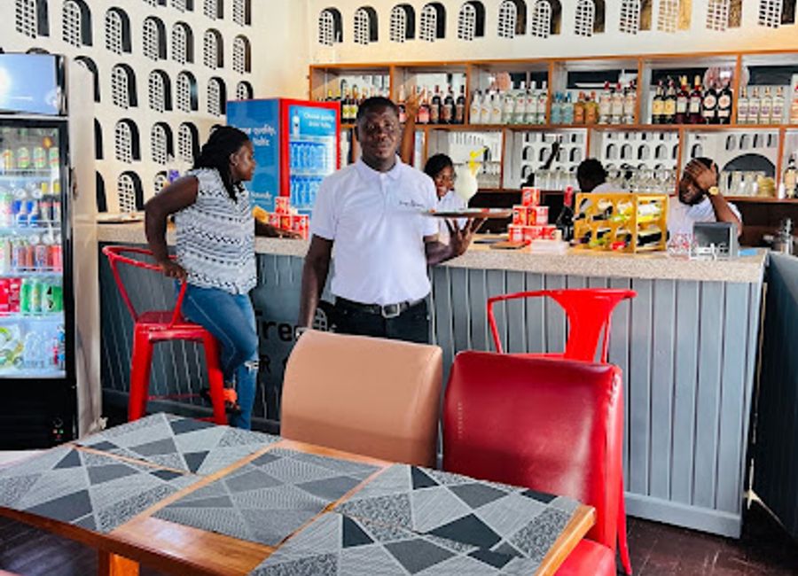 Experience authentic Ghanaian cuisine at Anomansa Restaurant near Elmina Castle – where every dish tells a story.