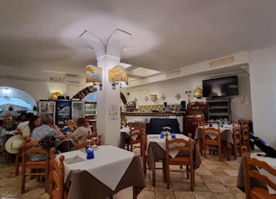 Experience authentic Italian cuisine at Da Maria, where delicious pizza and fresh seafood meet stunning coastal views in Amalfi.
