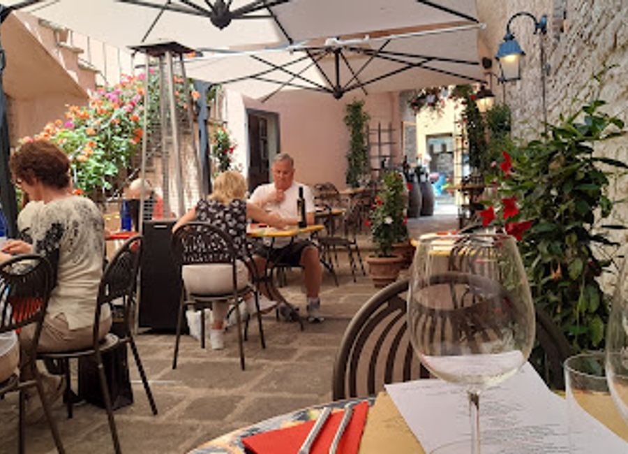 Experience authentic Italian dining at Enoteca Mazzini in Assisi, where exquisite flavors meet an extensive selection of fine wines.