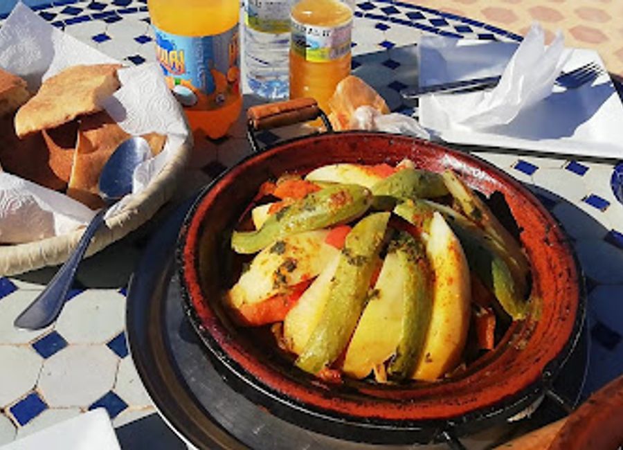 Experience delicious Moroccan cuisine at Snack chez Toufik, where authentic flavors meet warm hospitality in the heart of Merzouga.