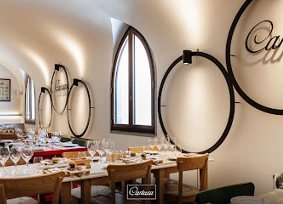 Experience exquisite Portuguese cuisine and fine wines at Enoteca Cartuxa in Évora - a culinary haven for travelers.