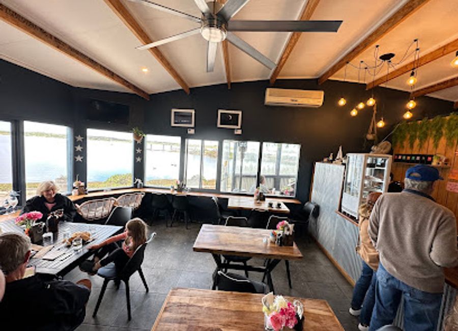 Discover delightful flavors and stunning views at The Deck Cafe on the Wharf in American River.