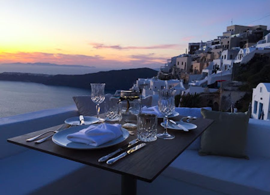 Discover exceptional Greek cuisine at The Athenian House in Imerovigli with stunning caldera views and elegant ambiance.