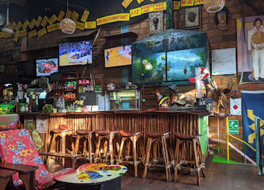 Experience an eclectic mix of American, Belgian, Chinese & Russian cuisines at The Yellow Rose of Texas Restaurant in Iquitos.