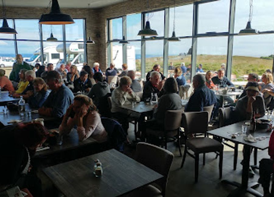 Experience Icelandic cuisine with stunning coastal views at Arnarstapi Center and Snjófell Restaurant in picturesque Arnarstapi.