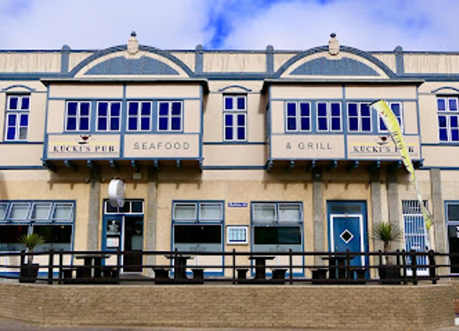 Experience the vibrant atmosphere at Kücki's Pub in Swakopmund - your destination for delicious food and refreshing drinks.