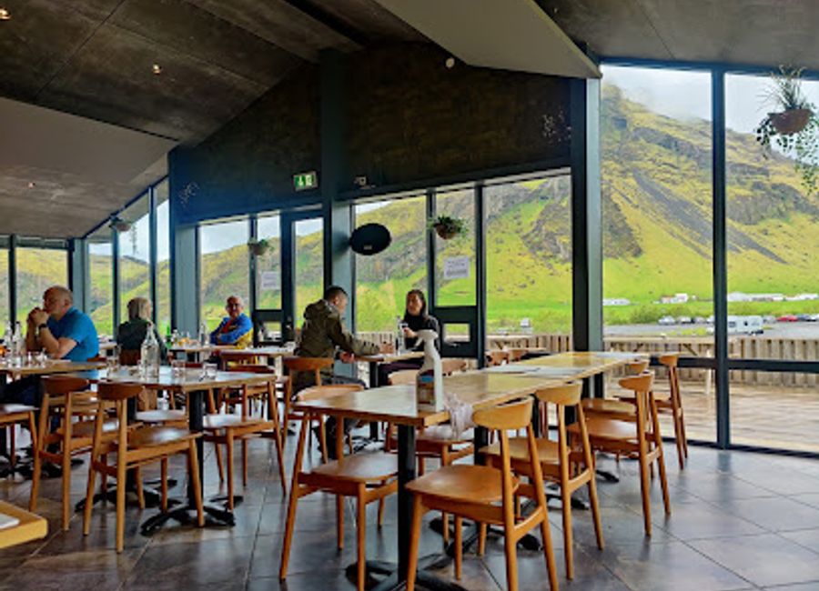 Savor authentic Icelandic cuisine at Skogafoss Bistro Bar near stunning waterfalls – an unmissable culinary experience!