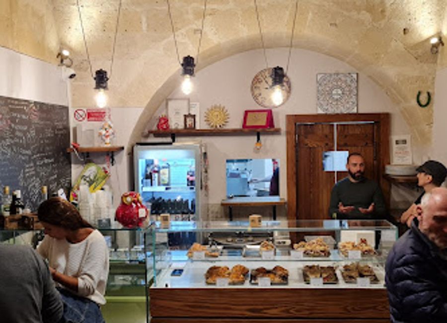 Discover authentic Italian flavors at Il Rusticone in Matera - where every pizza tells a story.