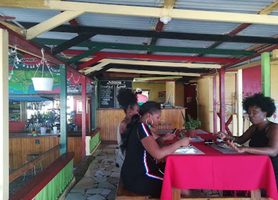 Experience authentic Jamaican cuisine at Jamaica Breeze in Port Antonio - where flavor meets relaxation in a vibrant setting.