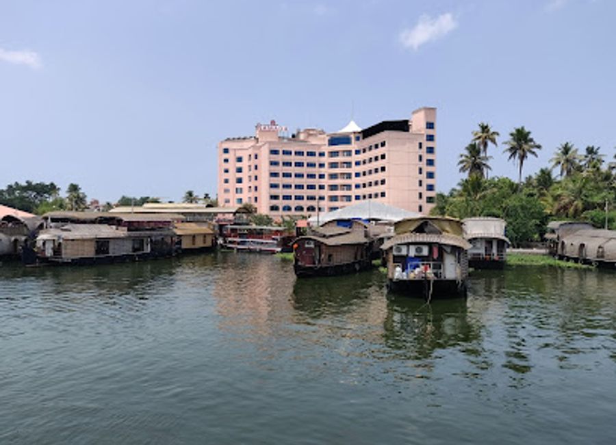 Experience exquisite Indian cuisine at World In The Pot - Ramada Alleppey while enjoying breathtaking views of Punnamada Lake.