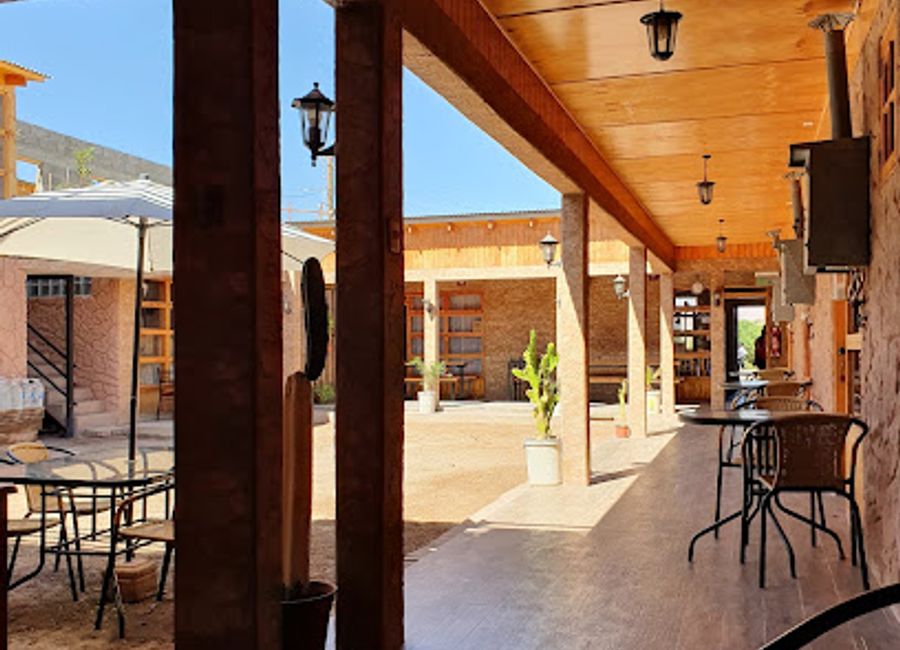 Discover authentic Chilean cuisine at La Tribu Del Indio in Toconao, where traditional flavors meet warm hospitality amidst stunning landscapes.