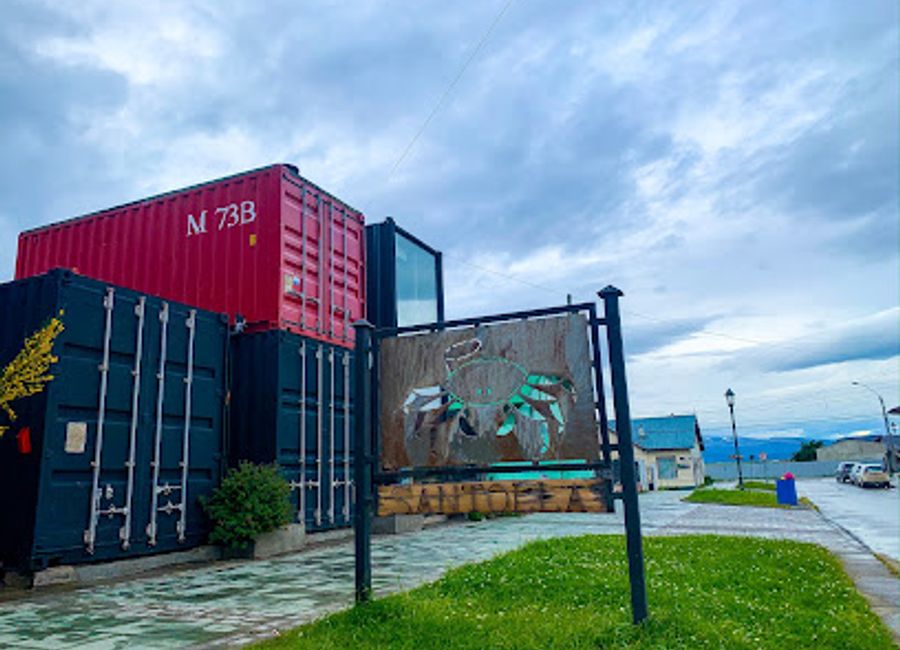 Experience the exquisite flavors of coastal Chile at Santolla, Natales' premier seafood restaurant offering fresh dishes in a welcoming setting.