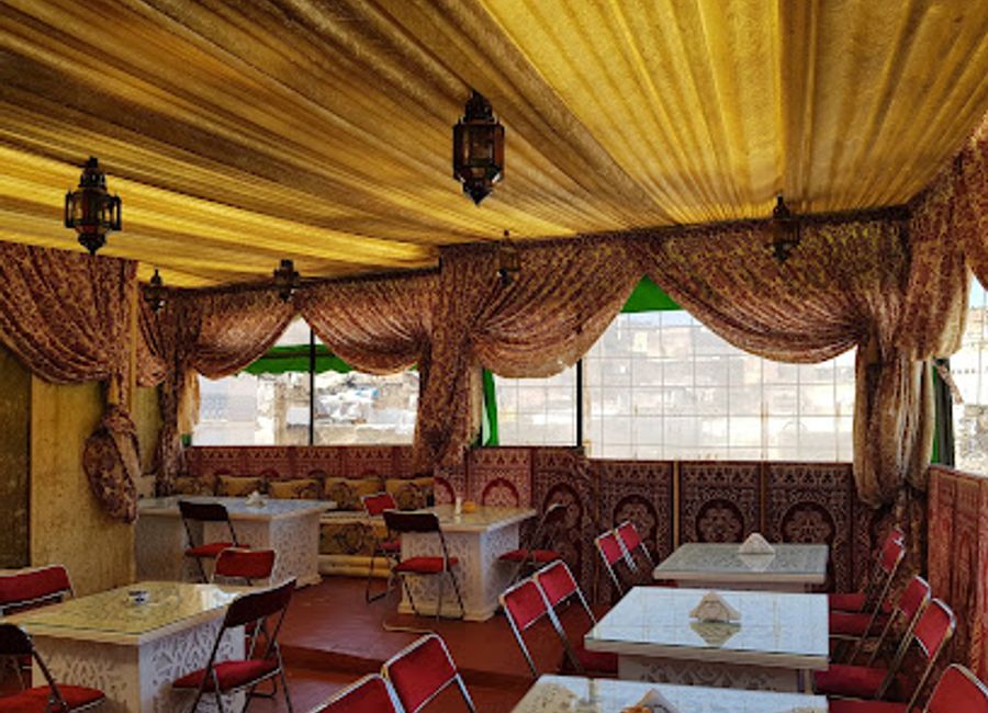 Experience authentic Moroccan cuisine in Fes at Les Mystères de Dar Tajine, where tradition meets flavor in every dish.