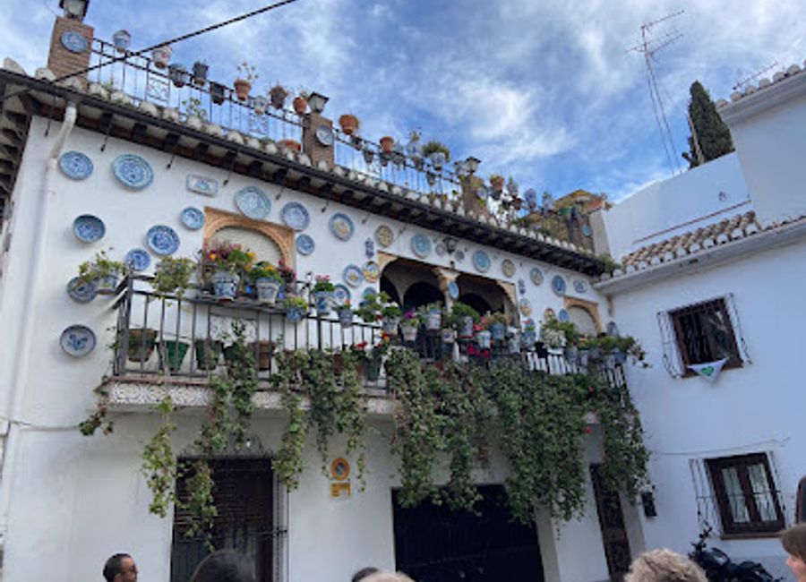 Experience exquisite dining at Estrellas de San Nicolás with breathtaking views of Alhambra in Granada's historic Albaicín district.
